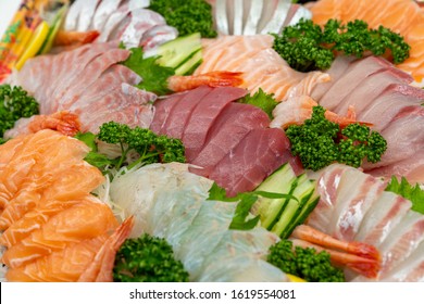  Raw Fish Sashimi Slice Traditional Japanese Food Set Includes Raw Salmon, Raw Tuna, Raw Yellow Tail (Hamachi),Raw Flounder(Hirame),Raw 
Shrimp.