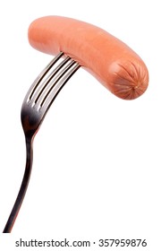 Raw Frankfurter Sausage On A Fork Isolated