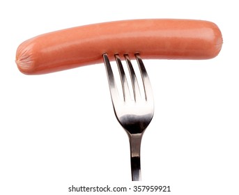 Raw Frankfurter Sausage On A Fork Isolated