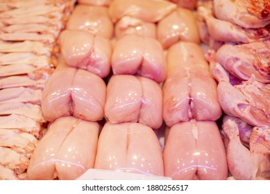 Raw Fresh Chicken Meat Slices On A Display Of A Market Counter