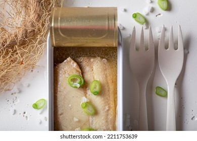 Raw And Fresh Herring In Can With Water And Oil. Herring In Sea Salt Water.