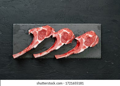 Raw fresh lamb ribs on dark background, close up. - Powered by Shutterstock