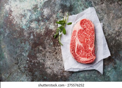 Raw Fresh Marbled Meat Black Angus Steak Ribeye On Metal Background