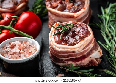 Raw Fresh Marbled Meat Steak Filet Mignon. Medallion Steaks Wrapped In Bacon Served On Old Meat Butcher, Culinary, Cooking Concept. Top View. Place For Text,