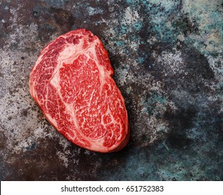 Raw Fresh Marbled Meat Steak Ribeye Black Angus On Metal Background