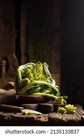 Raw Fresh Romanesco Cabbage On Wooden Board.Vegetable Photo In Dark Rustic Style.Close Up.