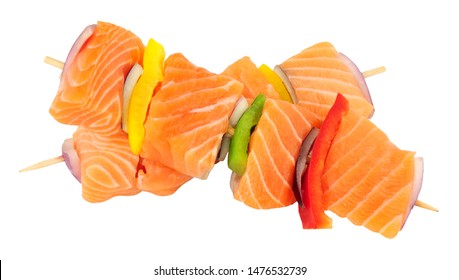 Raw fresh salmon and sweet pepper kebabs isolated on a white background