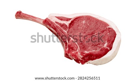 Raw fresh tomahawk beef steak with bone on white surface