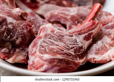 Raw Frozen Bloody Lamb Chops Meat In Plate 