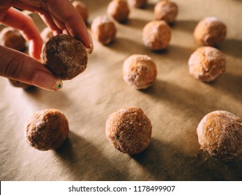 Raw Frozen Meat Balls On Baking Sheet With Paper.