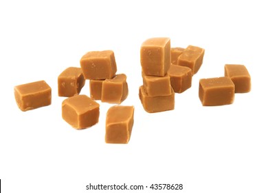 Raw Golden Caramel Pieces Isolated On White Background.