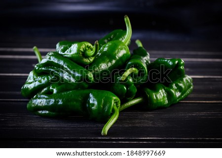Raw green hot mexican peppers jalapeno pimientos padron spanish tapas. High quality photo