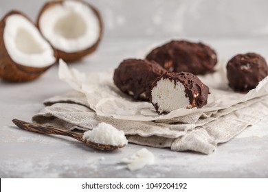 Raw homemade vegan chocolate coconut dessert bounty. Healthy vegan food concept. - Shutterstock ID 1049204192