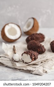 Raw homemade vegan chocolate coconut dessert bounty. Healthy vegan food concept. - Shutterstock ID 1049204207