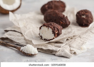 Raw homemade vegan chocolate coconut dessert bounty. Healthy vegan food concept. - Shutterstock ID 1059160058