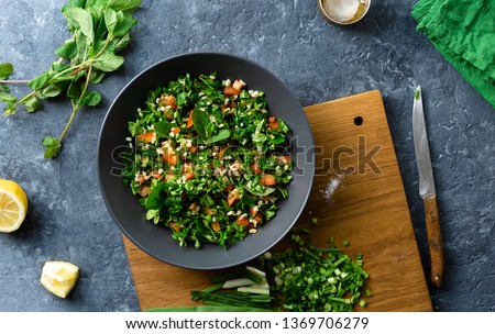 Raw ingredients cooking salad tabouli top view Healthy food
