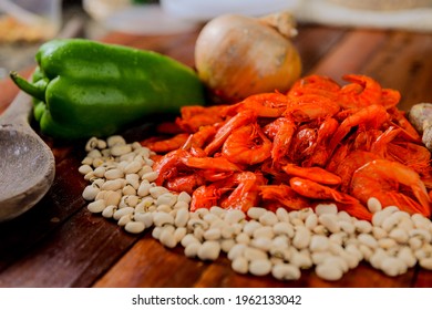 Raw Ingredients For Acarajé.
Shrimp, Peppers, Beans And Onions Assembled With Emphasis On Traditional Shrimp.