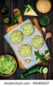 Raw Ingredients For Vegetarian Dinner Recipe. Preparing Veggies Cutlets Or Patties For Burgers. Zucchini Quinoa Veggie Burger With Pesto Sauce And Sprouts. Top View, Overhead, Flat Lay