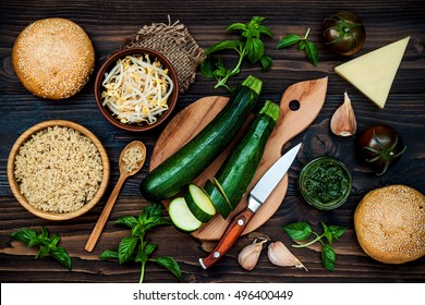 Raw Ingredients For Vegetarian Dinner Recipe. Preparing Veggies Cutlets Or Patties For Burgers. Zucchini Quinoa Veggie Burger With Pesto Sauce And Sprouts. Top View, Overhead, Flat Lay