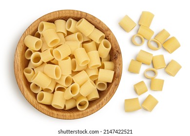 Raw Italian Pasta In Wooden Bowl Isolated On White Background With Clipping Path . Mezze Maniche Rigate Bronze Die. Top View. Flat Lay.