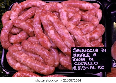 Raw Italian Sausage Ready To Be Cooked. Meat For Sale In The Butcher's Shop. In The Signs Written In Italian 