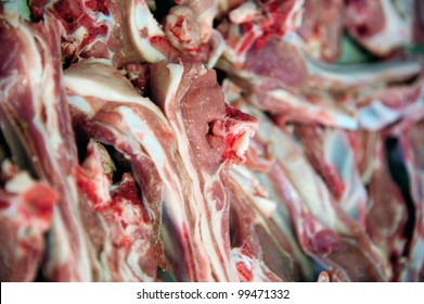 raw lamb chops on a ready to be coocked - Shutterstock ID 99471332
