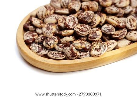 Raw lima beans on white background.