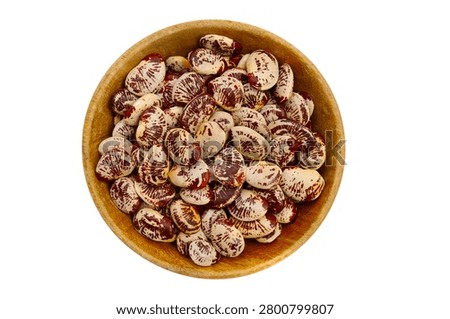 Raw lima beans on white background.