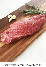 Raw London Broil On Cutting Board