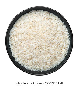 Raw long grain rice in black ceramic bowl isolated on white. Heap of uncooked basmati or jasmine rice. Healthy vegetarian organic food ingredient