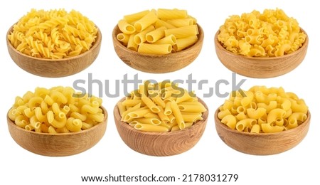 raw macaroni pasta in wooden bowl isolated on white background with clipping path and full depth of field. Set or collection