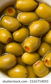 Raw Marinated Organic Green Olives With Pimento Peppers