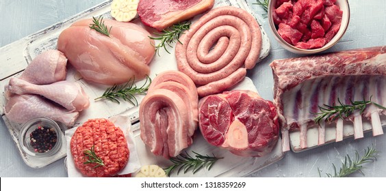 Raw Meat - Beef, Pork, Lamb, Chicken With Seasoning . Top View With Copy Space. Panorama, Banner