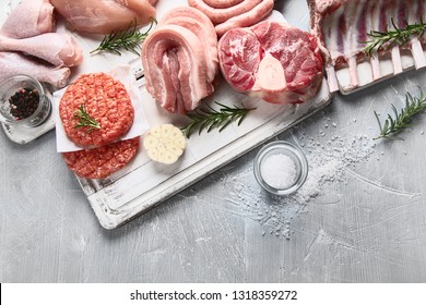 Raw Meat - Beef, Pork, Lamb, Chicken With Seasoning . Top View With Copy Space