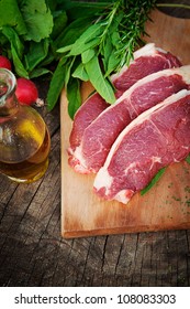 Raw Meat With Fresh Vegetables And Rosemary