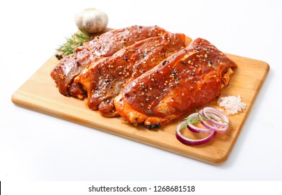 Raw meat in a marinade with grilled spices. - Powered by Shutterstock