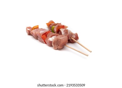 Raw Meat And Vegetable Skewer, Isolated On White Background. In Gastronomy, Brochette (from The French Brochette, Meaning 