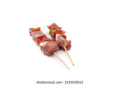 Raw Meat And Vegetable Skewer, Isolated On White Background. In Gastronomy, Brochette (from The French Brochette, Meaning 