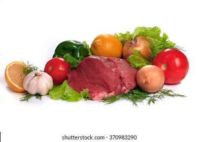 Raw Meat And Vegetables On A White Background