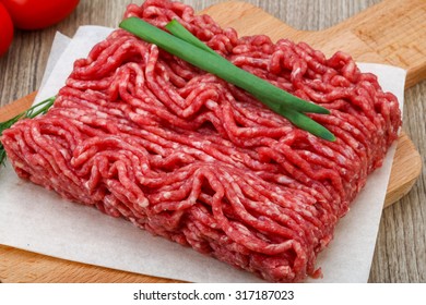 Raw minced beef meat with green oinion and dill