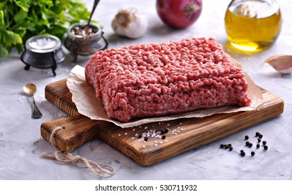 Raw Minced Beef On A Cutting Board.