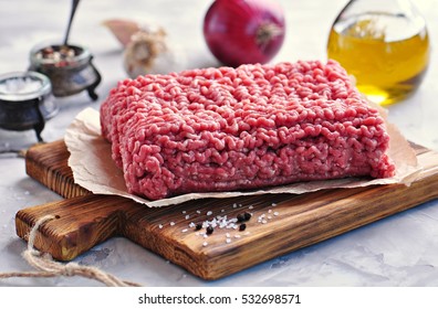 Raw Minced Beef On A Cutting Board.