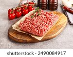 Raw minced beef uncooked meat over board