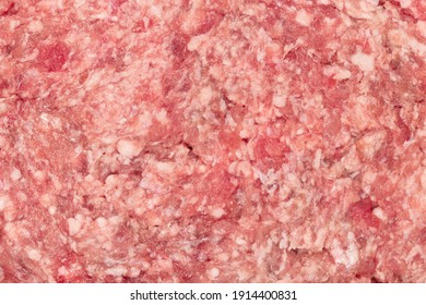 Raw minced meat texture background. Chopped meat background.  fresh raw ground pork heap. Top view.