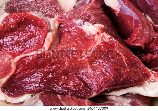 Raw mutton meat\
bacground. Macro shot