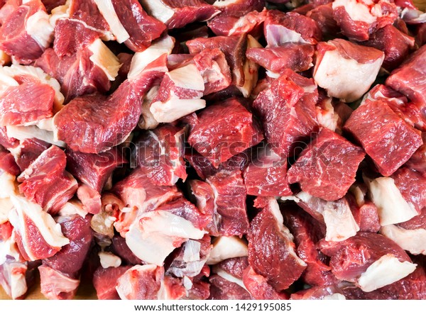 Raw mutton meat\
bacground. Macro shot