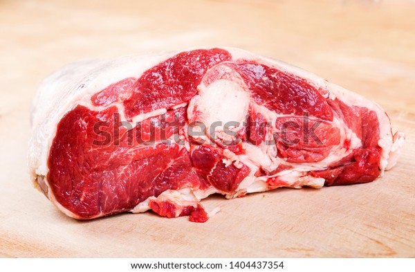 Raw mutton meat with\
rib.Macro shot