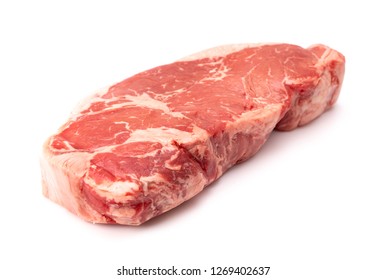 A Raw New York Strip Steak On A White Background