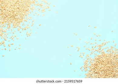 Raw oatmeal on color background