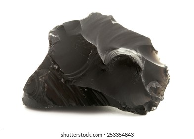 Raw obsidian on a white background - Shutterstock ID 253354843